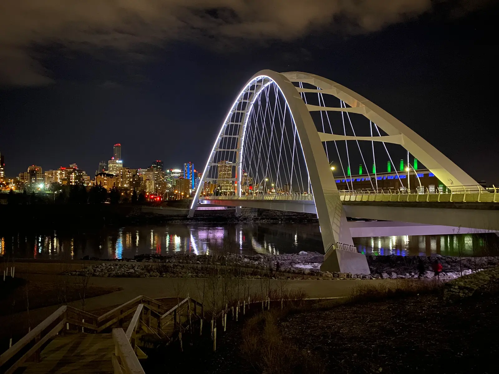 Walterdale Bridge lit at night with the Edmonton skyline